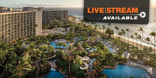 Aerial view of a tropical resort with a swimming pool, waterslide, palm trees, and lounge chairs. Accredited CME conferences at The Westin Maui Resort & Spa in Ka'anapali, Maui, Hawaii.
