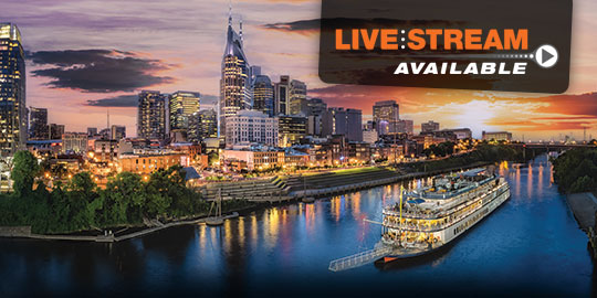 A brightly lit riverboat cruises along the Cumberland River against the backdrop of the illuminated Nashville skyline, offering a unique setting for CME/CE conferences with live stream options.