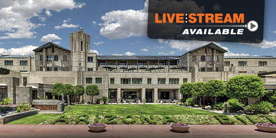 Elegant exterior view of the Arizona Biltmore in Phoenix, surrounded by lush greenery, promoting livestream CME conference opportunities.