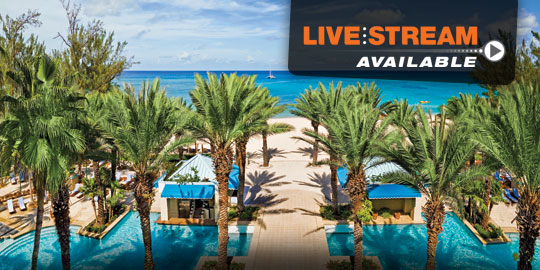 View of the luxurious Grand Cayman Westin resort with palm-lined pools overlooking the ocean, promoting livestream CME conference options.