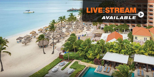 Beachfront view at the Hyatt Regency Aruba Resort featuring white sand and turquoise water.